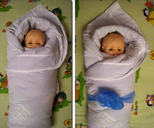 Купить пеленание. Как запеленать новорожденного в конверт одеяло. Пеленание в одеяло новорожденного. Запеленать ребенка в одеяло. Пеленание новорожденного в одеяло на выписку.